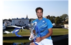 EASTBOURNE, ENGLAND - JUNE 21:  Feliciano Lopez of Spain poses with the trophy after beating Richard Gasquet of France during their Men's Singles Finals match on day eight of the Aegon International at Devonshire Park on June 21, 2014 in Eastbourne, England. (Photo by Jan Kruger/Getty Images)